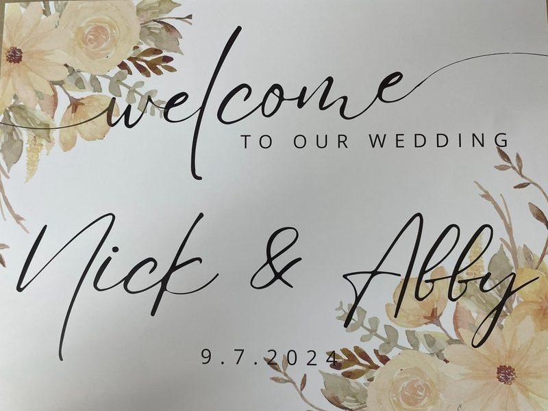 Nick & Abby welcome sign with blush florals